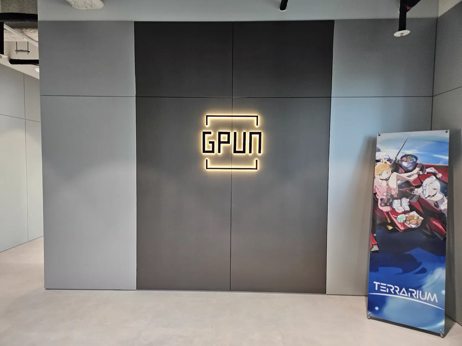 GPUN illuminated lobby sign with TERRARIUM banner