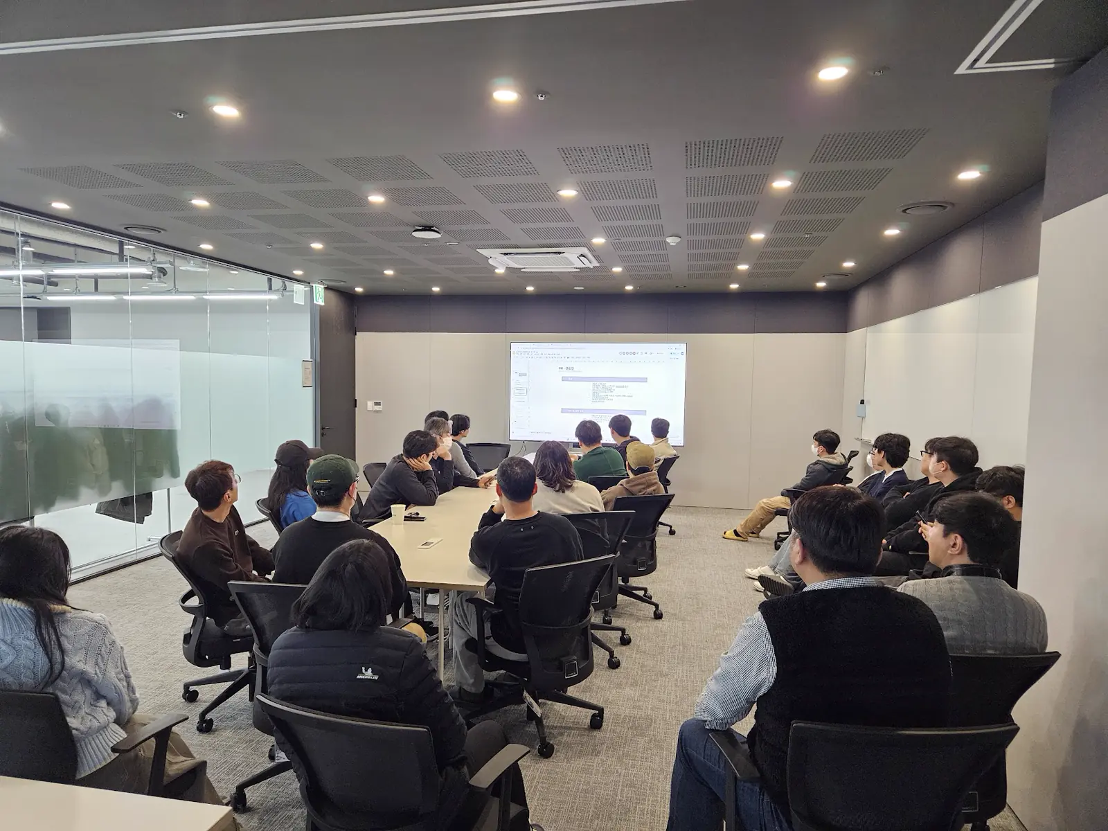 GPUN gameplay review meeting in a conference room