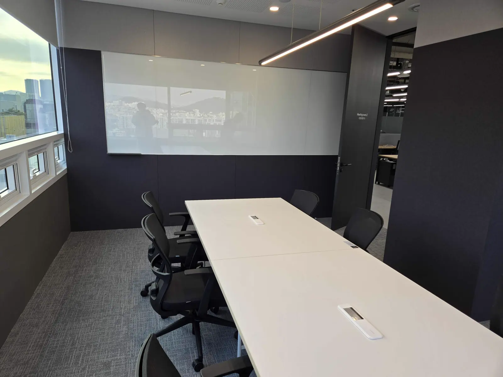 GPUN lounge and pantry area with phone booth